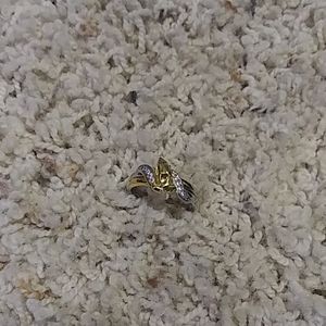 Diamond and gold with silver ring